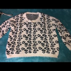 White and black cheetah sweater